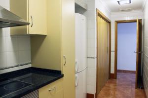 Kuchyň nebo kuchyňský kout v ubytování Apartment Gandia Playa Venecia