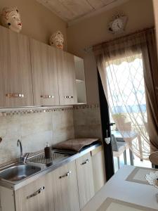 Kuchyňa alebo kuchynka v ubytovaní Emyteo Apartment
