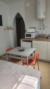 Kuchyňa alebo kuchynka v ubytovaní CASA MORENA MiA APARTAMENTOS