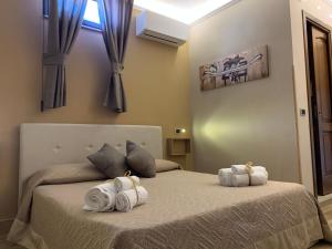 Posteľ alebo postele v izbe v ubytovaní Emyteo Apartment