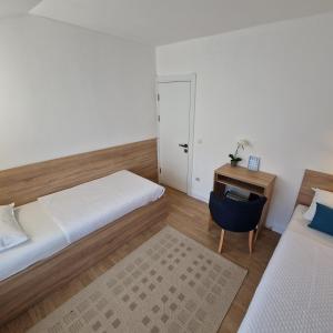 Postel nebo postele na pokoji v ubytování Apartment Roosevelt