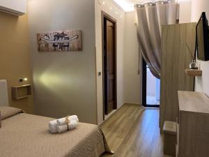 Televízia a/alebo spoločenská miestnosť v ubytovaní Emyteo Apartment