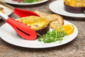 a plate of food with an egg dish and toast at Colborne Bed and Breakfast in Goderich