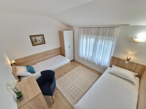 Postel nebo postele na pokoji v ubytování Apartment Roosevelt