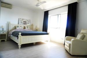 Posteľ alebo postele v izbe v ubytovaní Villa Seaview Suncoast Luxury