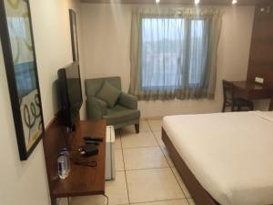 TV a/nebo společenská místnost v ubytování Hotel Kanan