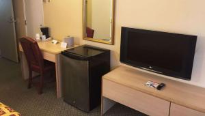 TV a/nebo společenská místnost v ubytování M Star Hotel Mansfield