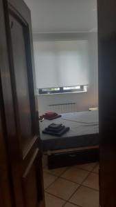 Postel nebo postele na pokoji v ubytování APARTMA ERNESTINO