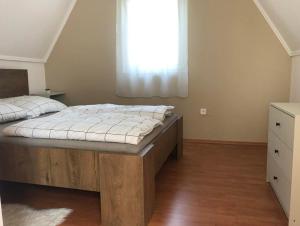 Postel nebo postele na pokoji v ubytování B&Z Vendégház