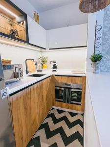 Kuchnia lub aneks kuchenny w obiekcie Apartamento moderno y acogedor cerca del mar