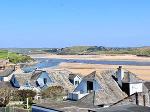 a view of a beach with houses and the ocean at Pendennis in Padstow