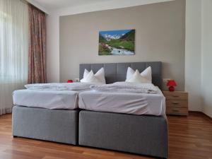 Katil atau katil-katil dalam bilik di Berghotel-Willingen