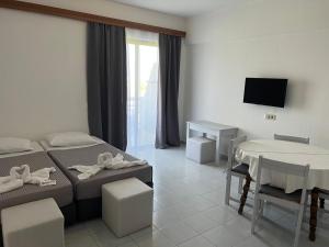 TV a/nebo společenská místnost v ubytování Smart Accommodation Rhodes