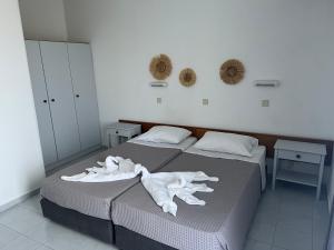 Postel nebo postele na pokoji v ubytování Smart Accommodation Rhodes + 15 fotografií