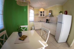 Køkken eller tekøkken på Captain's House