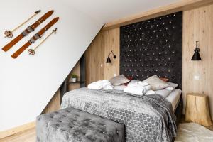 Posteľ alebo postele v izbe v ubytovaní Apartamenty GAWRY Lux & Spa