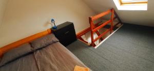 Ένα ή περισσότερα κρεβάτια σε δωμάτιο στο Casa de vacanta - Vendeghaz
