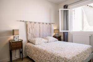 Posteľ alebo postele v izbe v ubytovaní Le Saint Amans