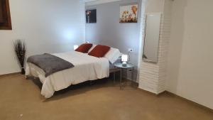 Posteľ alebo postele v izbe v ubytovaní CASA MORENA MiA APARTAMENTOS