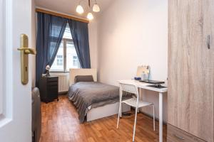 Postel nebo postele na pokoji v ubytování Apartment Lublanska 48