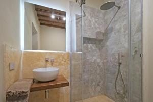 Vannituba majutusasutuses Delcorto Suites