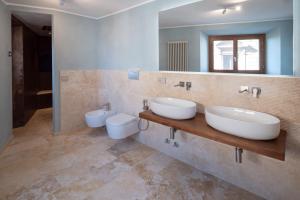 Vannituba majutusasutuses Delcorto Suites