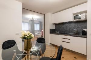 Kuchyň nebo kuchyňský kout v ubytování Milan Duomo Suites