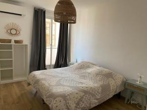 Posteľ alebo postele v izbe v ubytovaní Ajaccio centre bord de mer T3