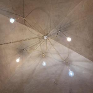 a ceiling with four lights in a room at B&B UNICI in Grammichele