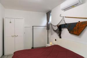 Postel nebo postele na pokoji v ubytování Le Coccinelle Home a Lierna