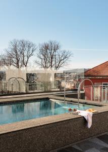 a large swimming pool in a building with at Sommerro in Oslo