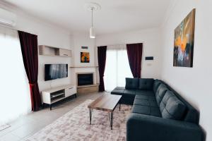 Телевизор и/или развлекательный центр в Luxuriant Houses Kyrenia