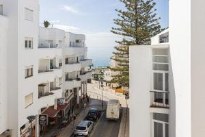 a view of a street from a building at Casa do Coral - Praia da Luz in Luz