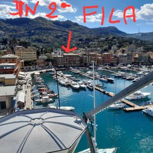 a view of a marina with boats in the water at Suites Margot in Santa Margherita Ligure