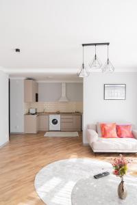 Kuchyň nebo kuchyňský kout v ubytování 71 East Apart Hotel