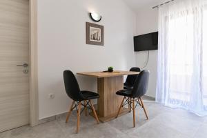 TV a/nebo společenská místnost v ubytování Apartments Andrea I
