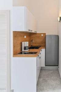 Kuchyň nebo kuchyňský kout v ubytování Apartments Andrea I