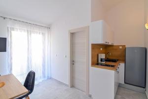 Kuchyň nebo kuchyňský kout v ubytování Apartments Andrea I