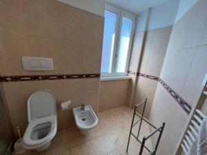 Bagno di Appartamenti Baia Azzurra 4.