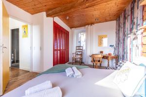 Posteľ alebo postele v izbe v ubytovaní La Maison Perchée