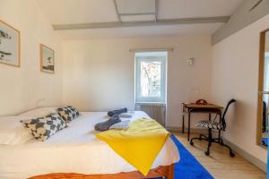 Posteľ alebo postele v izbe v ubytovaní La Maison Perchée