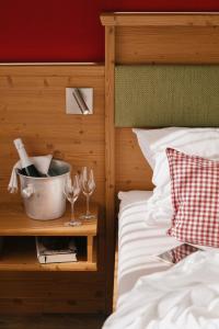 Postel nebo postele na pokoji v ubytování Berghotel Wiedener Eck