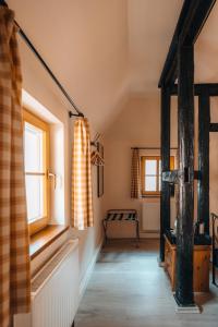 Postel nebo postele na pokoji v ubytování Watzdorfer Geleitschenke und Herberge