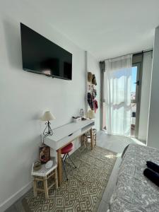 TV a/nebo společenská místnost v ubytování Casa Uma