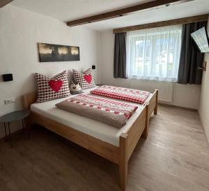 Postel nebo postele na pokoji v ubytování Ferienwohnungen LODGE-B