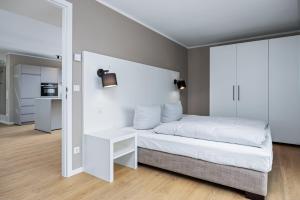 Postel nebo postele na pokoji v ubytování Strandresidenzen Binz-Prora Strandresidenzen Binz-Prora D5 6