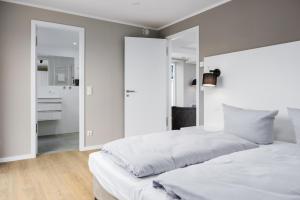 Postel nebo postele na pokoji v ubytování Strandresidenzen Binz-Prora Strandresidenzen Binz-Prora D5 6