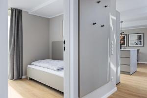 Postel nebo postele na pokoji v ubytování Strandresidenzen Binz-Prora Strandresidenzen Binz-Prora D5 6