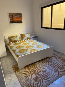 Ένα ή περισσότερα κρεβάτια σε δωμάτιο στο Apartamento El Prisma