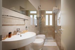 Koupelna v ubytování Hotel Sabbie d'Oro